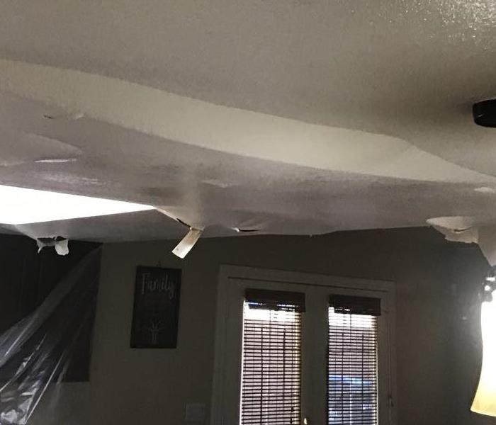 This falling ceiling was caused by toilet backup